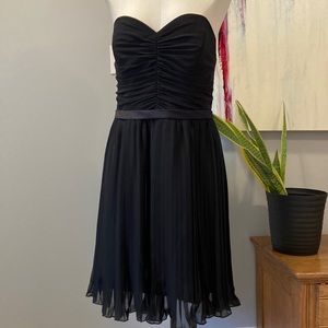 Black Formal strapless dress with pleated skirt